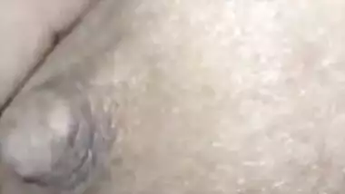 Close-up XXX video of the Indian man playing with wife's nipples