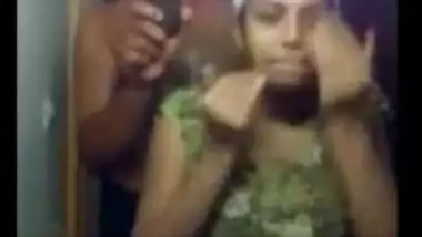 Woman has sex tits to expose in the XXX shower cabin and before mirror