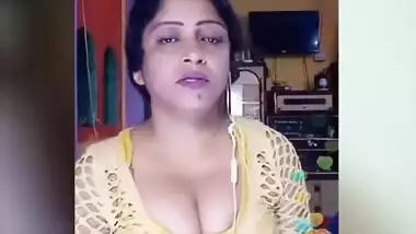 Desi Aunty showing cleavage on live cam.