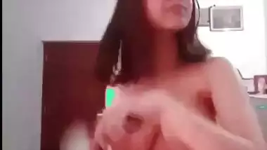 Indian nude babe strips on camera and shows her boobs