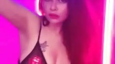 Enticing young woman reveals private parts posing in XXX lingerie