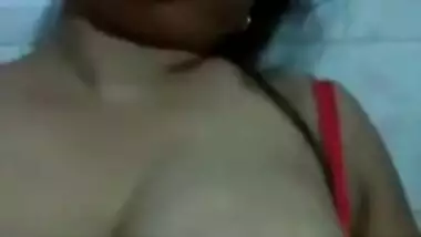 Eye-catching Indian girl has fun playing with sexy huge nipples