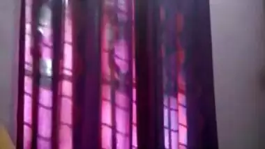 Tempting teen Desi lies down on her back to rub XXX body for sex show