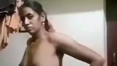 Unsatisfied Tamil village aunty striptease nude MMS