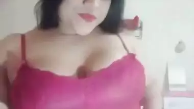 Big boob nude girl shows her butt and squeezes her boobs