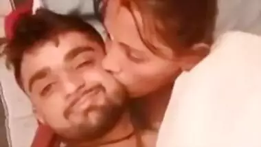 Man looks into the camera posing with sex Desi partner in XXX poses