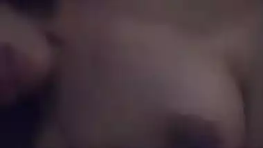 Young gal in red lingerie teases her XXX Desi pussy for the camera