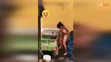 Horny Desi aunty fingering hairy pussy while bathing in a outdoor